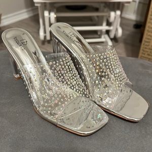 EUC I. D. Required silver clear slide on heels
